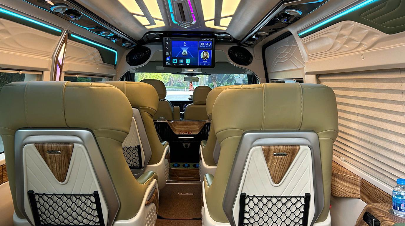 Nội thất khoang thương gia xe limousine 9 chỗ VIP DKT Transport ghế da ngả massage cao cấp